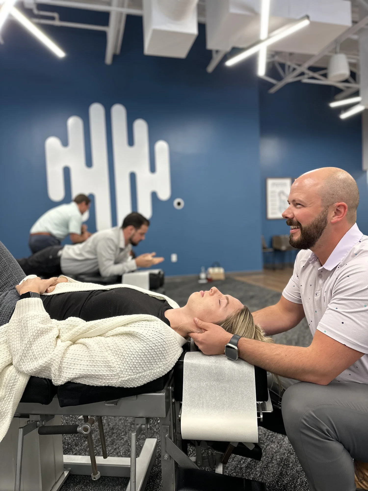 An Ability Chiropractic doctor adjusting a patient’s neck